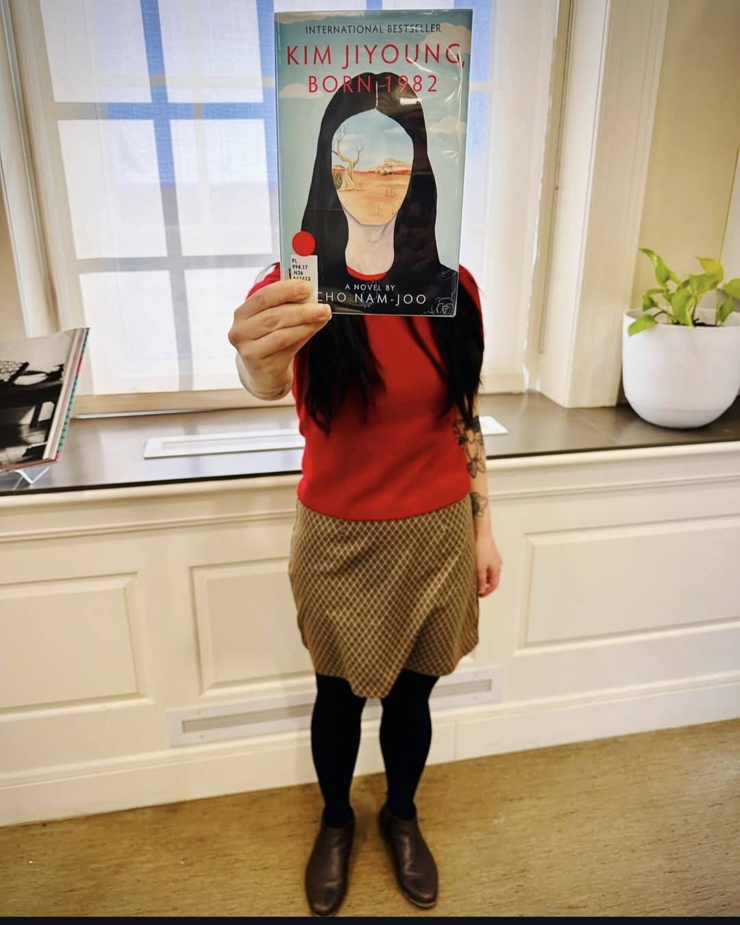 Photo of me with the novel Kim Jiyoung